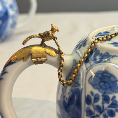 A pair of Chinese blue and white lotus-shaped teapots with mounts — photo 8