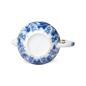 A pair of Chinese blue and white lotus-shaped teapots with mounts — photo 13