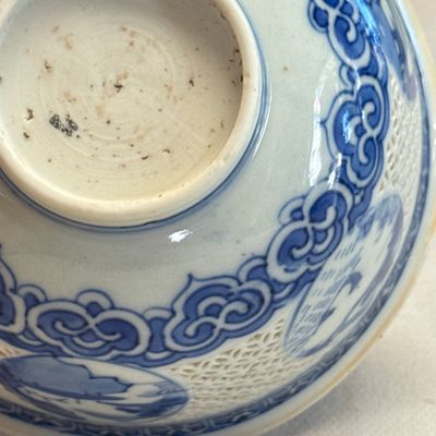 A pair of Chinese blue and white reticulated 'Linglong' bowls with landscape panels — photo 42