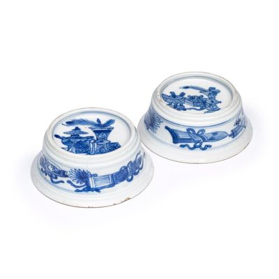 A pair of Chinese blue and white salt trenchers with antiquities design, Kangxi