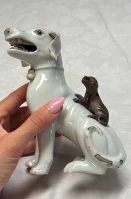 A pair of Chinese export white-glazed and biscuit models of hounds with pups — photo 13