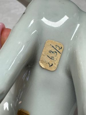 A pair of Chinese export white-glazed and biscuit models of hounds with pups — photo 9