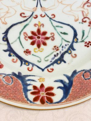A pair of Chinese famille rose 'Winged Putti' plates — photo 5