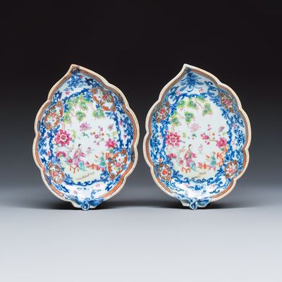 A pair of Chinese famille rose leaf-shaped saucers with figural design, Qianlong