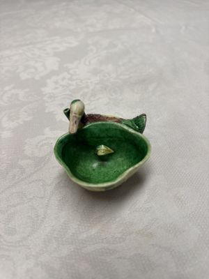 A pair of Chinese famille verte sancai biscuit duck-and-lotus-form water droppers on later wooden stands — photo 11