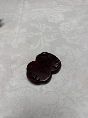 A pair of Chinese famille verte sancai biscuit duck-and-lotus-form water droppers on later wooden stands — photo 14