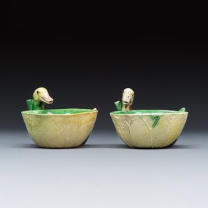 A pair of Chinese famille verte sancai biscuit duck-and-lotus-form water droppers on later wooden stands — photo 2