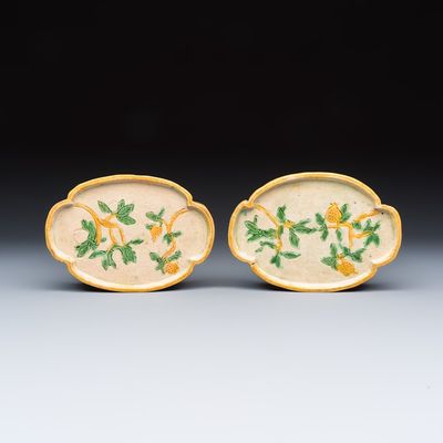 A pair of Chinese sancai-glazed stoneware quadrilobed trays with fruiting branches, Ming