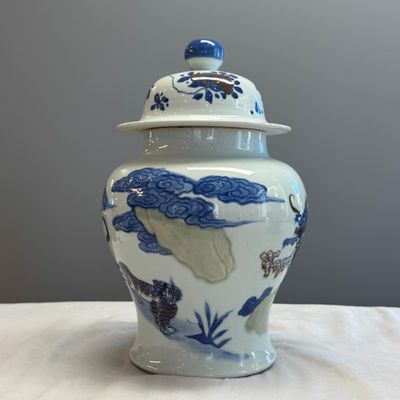A pair of Chinese underglaze-blue, copper-red and celadon-glazed 'Dragon and Tiger' vases and covers — photo 2