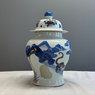 A pair of Chinese underglaze-blue, copper-red and celadon-glazed 'Dragon and Tiger' vases and covers — photo 4