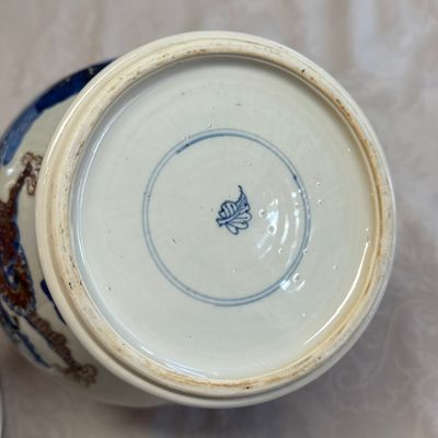 A pair of Chinese underglaze-blue, copper-red and celadon-glazed 'Dragon and Tiger' vases and covers — photo 43