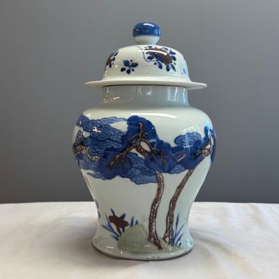 A pair of Chinese underglaze-blue, copper-red and celadon-glazed 'Dragon and Tiger' vases and covers — photo 5