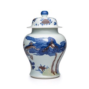 A pair of Chinese underglaze-blue, copper-red and celadon-glazed 'Dragon and Tiger' vases and covers — photo 11
