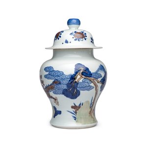 A pair of Chinese underglaze-blue, copper-red and celadon-glazed 'Dragon and Tiger' vases and covers — photo 3