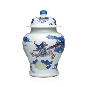 A pair of Chinese underglaze-blue, copper-red and celadon-glazed 'Dragon and Tiger' vases and covers — photo 10