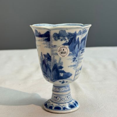 A rare Chinese blue and white 'Mountainous Landscape' lobed goblet — photo 1