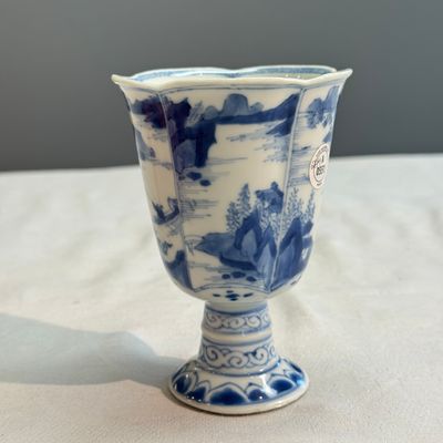 A rare Chinese blue and white 'Mountainous Landscape' lobed goblet — photo 2