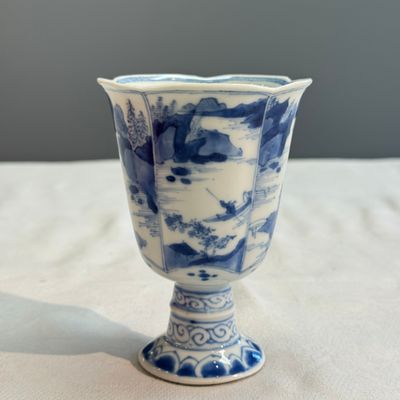 A rare Chinese blue and white 'Mountainous Landscape' lobed goblet — photo 3