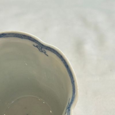 A rare Chinese blue and white 'Mountainous Landscape' lobed goblet — photo 9