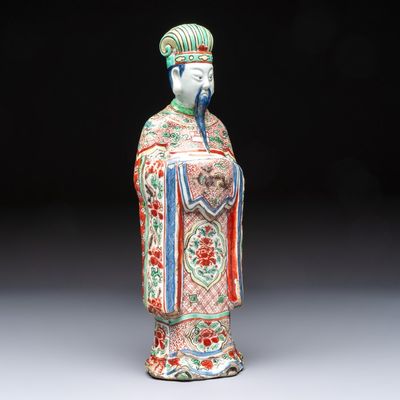 A rare Chinese wucai figure of a dignitary, late Ming/Transitional period