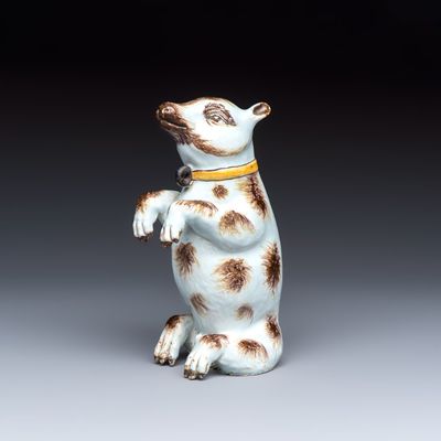 A rare polychrome Dutch Delft model of a seated bear, 18th C.
