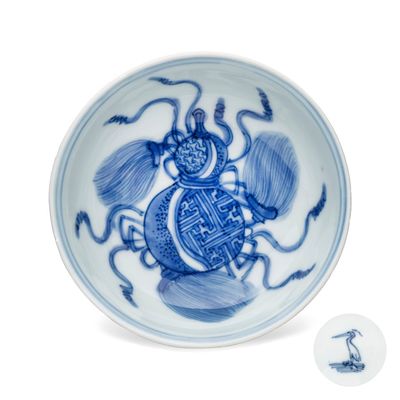 A very rare Chinese blue and white 'Double Gourd' shallow bowl, Egret mark, Wanli