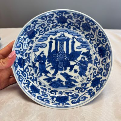 An extremely rare pair of Chinese blue and white 'Foreigners Presenting Treasures' plates — photo 1