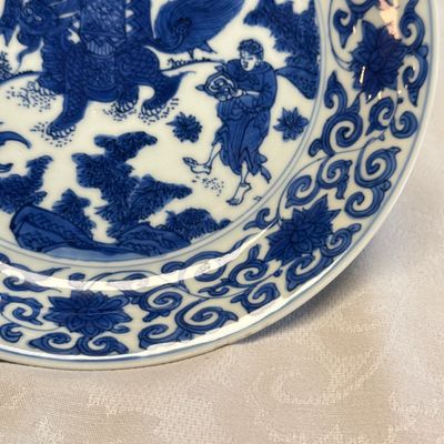 An extremely rare pair of Chinese blue and white 'Foreigners Presenting Treasures' plates — photo 26