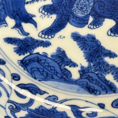 An extremely rare pair of Chinese blue and white 'Foreigners Presenting Treasures' plates — photo 8