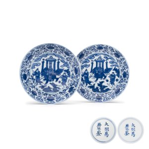 An extremely rare pair of Chinese blue and white 'Foreigners Presenting Treasures' plates — photo 1