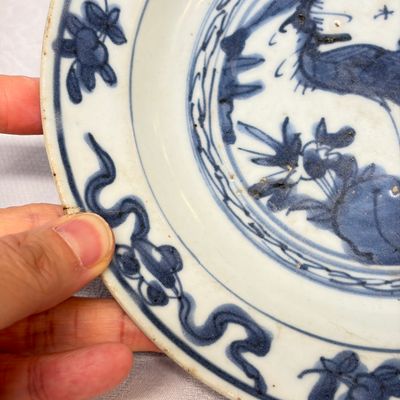 Two Chinese blue and white bowls, a plate, a celadon kendi and a vase — photo 6