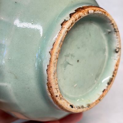 Two Chinese blue and white bowls, a plate, a celadon kendi and a vase — photo 50