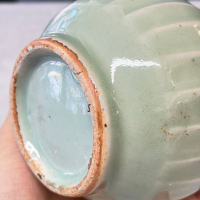 Two Chinese blue and white bowls, a plate, a celadon kendi and a vase — photo 51