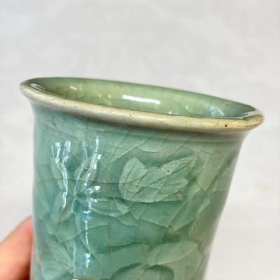 Two Chinese blue and white bowls, a plate, a celadon kendi and a vase — photo 57
