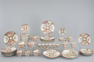 A 62-piece Chinese Canton rose medallion armorial 6-person service of big and small plates, cups and saucers, egg cups and serving trays, 19t C.