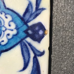 A bichrome Iznik border tile with saz leaves, cloud bands and a rosette, Turkey, 2nd quarter 16th C. — 照片 5