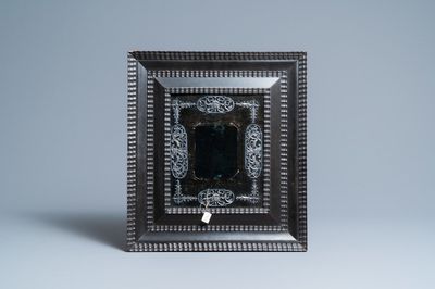 A blackened pearwood frame with pewter ornaments, 17th C.