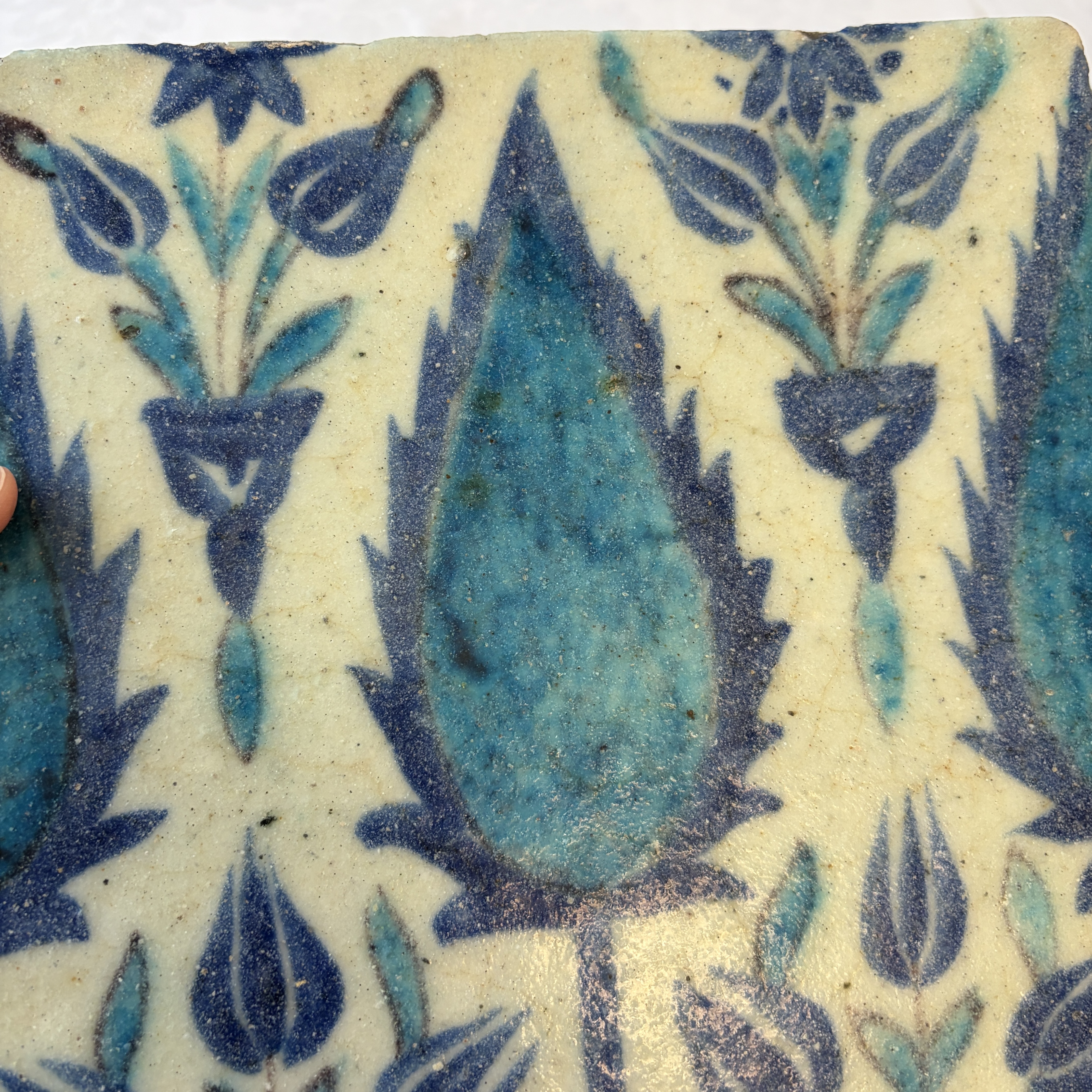 A blue and turquoise Damascus pottery tile with cypress trees — photo 5