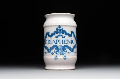 A blue and white Brussels faience albarello with a satyr head, inscribed 'E. DIAPHENIC:', 18th C.