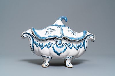 A blue and white Brussels faience rocaille tureen and cover, 18th C.