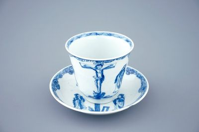 A blue and white Chinese cup and saucer with "The crucifixion", Kangxi