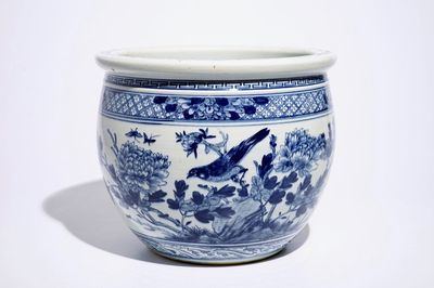A blue and white Chinese fishbowl with birds among flowers, 19th C.