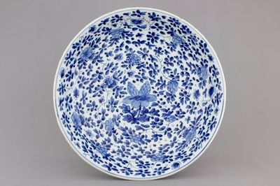 A blue and white Chinese porcelain dish with floral scrolls, Kangxi, ca. 1700