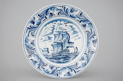 A blue and white dish with a large battle ship, Bolsward, Friesland, 18th C.