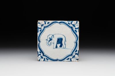 A blue and white Dutch Delft 'accolades border' 'elephant' tile, 17th C.
