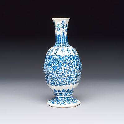 A blue and white Dutch Delft bottle vase with lotus scrolls, 17th C.