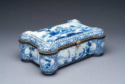 A blue and white Dutch Delft bronze-mounted casket, 19th C.