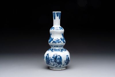 A blue and white Dutch Delft double gourd chinoiserie vase, 17th C.
