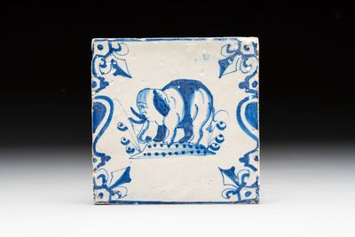 A blue and white Dutch Delft 'elephant' 'candelabra' tile, 17th C.