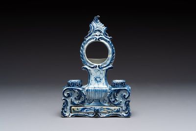 A blue and white Dutch Delft inkwell with pocket watch holder, 18th C.